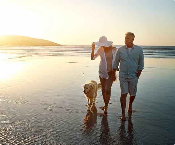 Man woman walking with dog