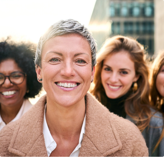 Women smiling together